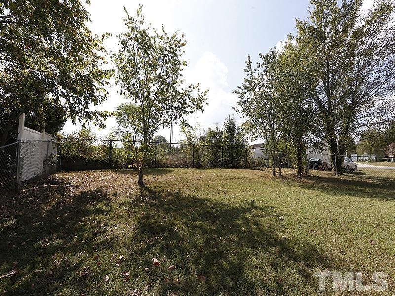 919 Dale Street Durham, NC 27701 - Photo 13 of 16 a view of outdoor space with trees