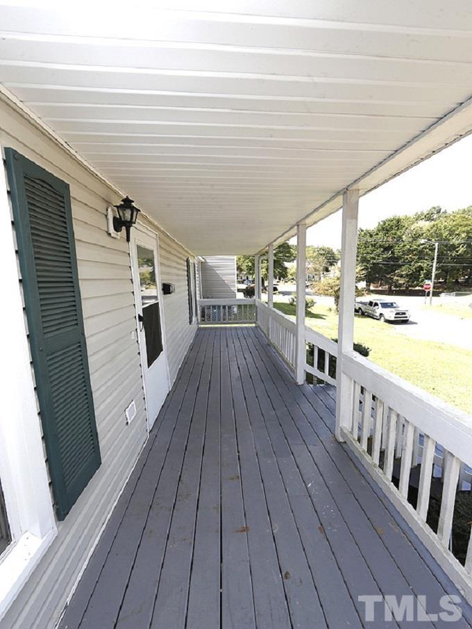 919 Dale Street Durham, NC 27701 - Photo 15 of 16 a view of a balcony with wooden floor