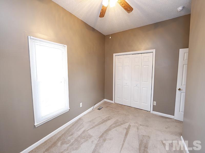 919 Dale Street Durham, NC 27701 - Photo 8 of 16 a view of an empty room and window