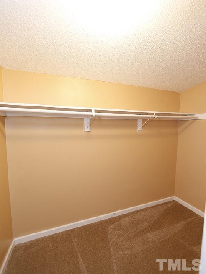919 Dale Street Durham, NC 27701 - Photo 9 of 16 a view of a room with racks on the wall