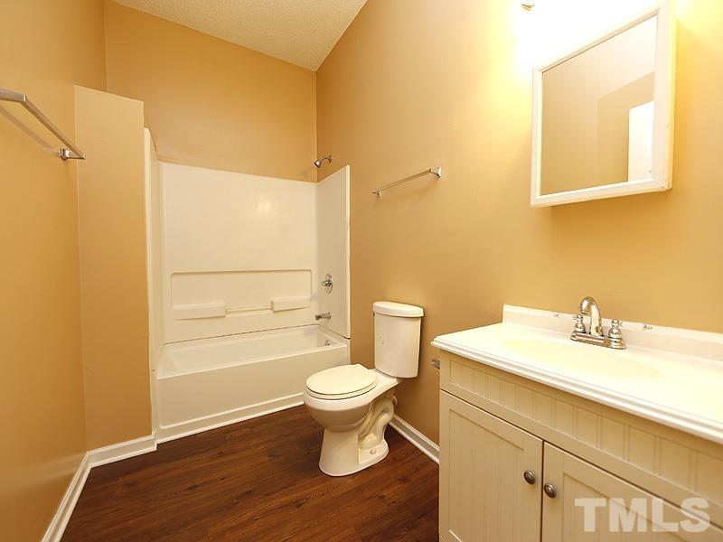 919 Dale Street Durham, NC 27701 - Photo 10 of 16 a bathroom with a sink and a toilet