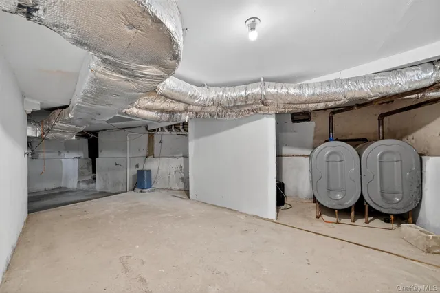 a view of a hallway with washer and dryer