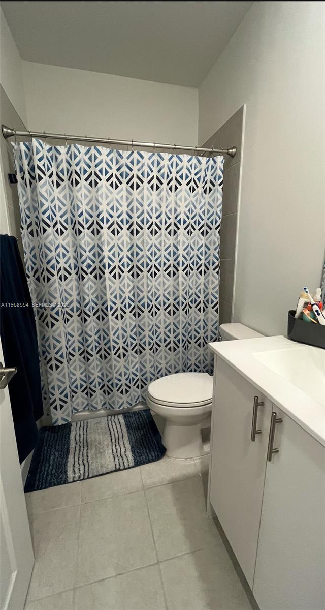 17982 Southwest 359th Street Homestead, FL 33034 - Photo 14 of 17 a bathroom with a toilet and a shower