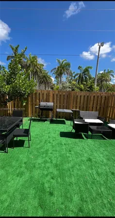 a view of a garden with a bench