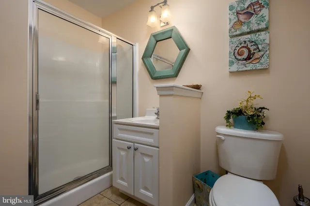 a kitchen with a sink window and cabinets