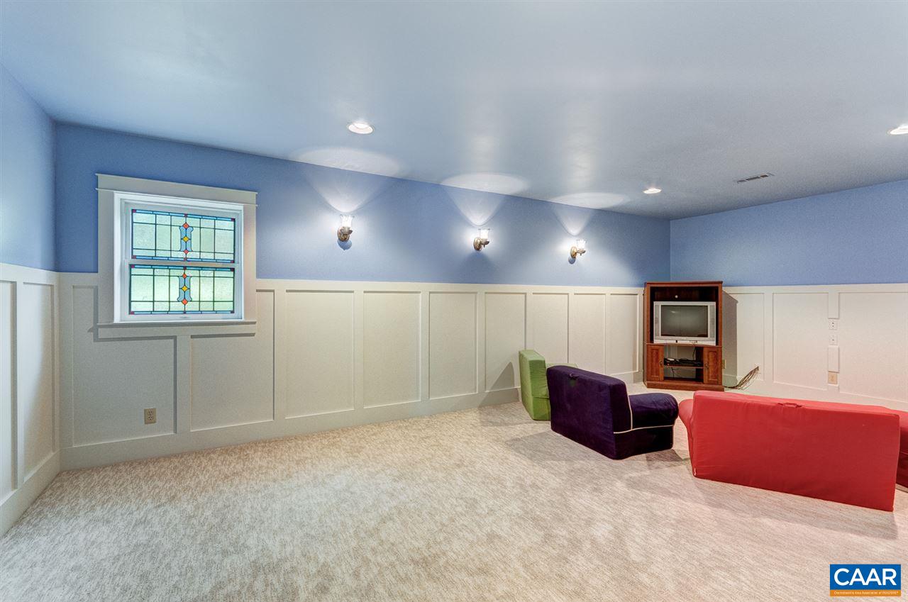 145 Ivy Ridge Road Charlottesville, VA 22901 - Photo 26 of 50 a projector room with furniture