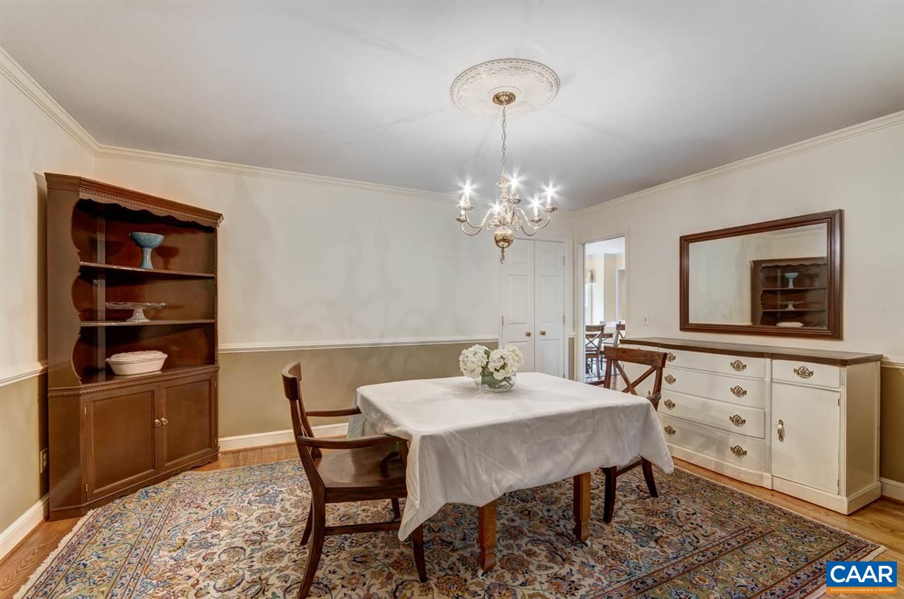 145 Ivy Ridge Road Charlottesville, VA 22901 - Photo 7 of 50 a view of a dining room with furniture and chandelier