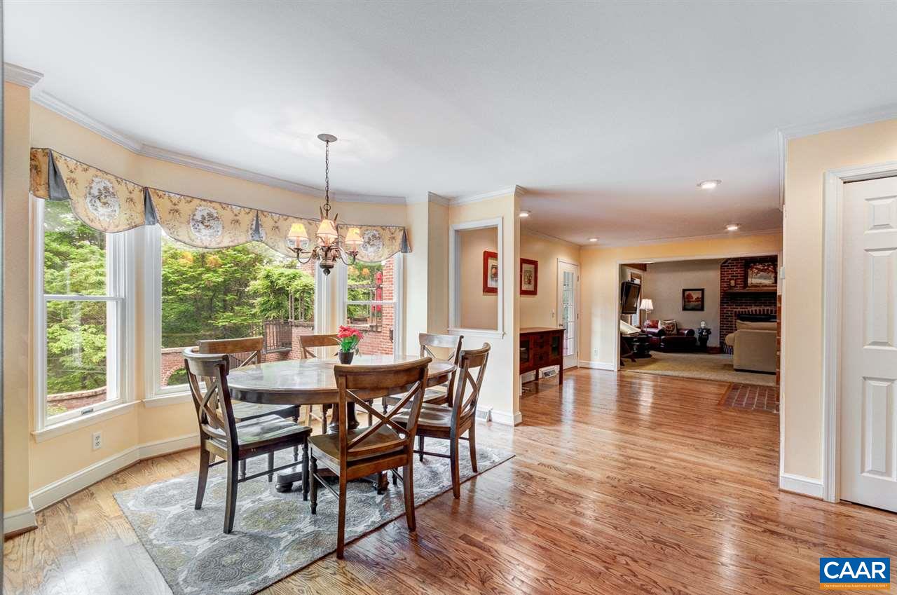 145 Ivy Ridge Road Charlottesville, VA 22901 - Photo 8 of 50 a dining room with furniture window wooden floor