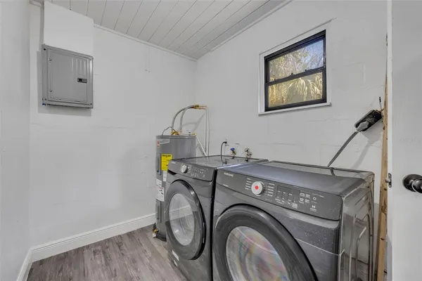 a utility room with dryer and washer