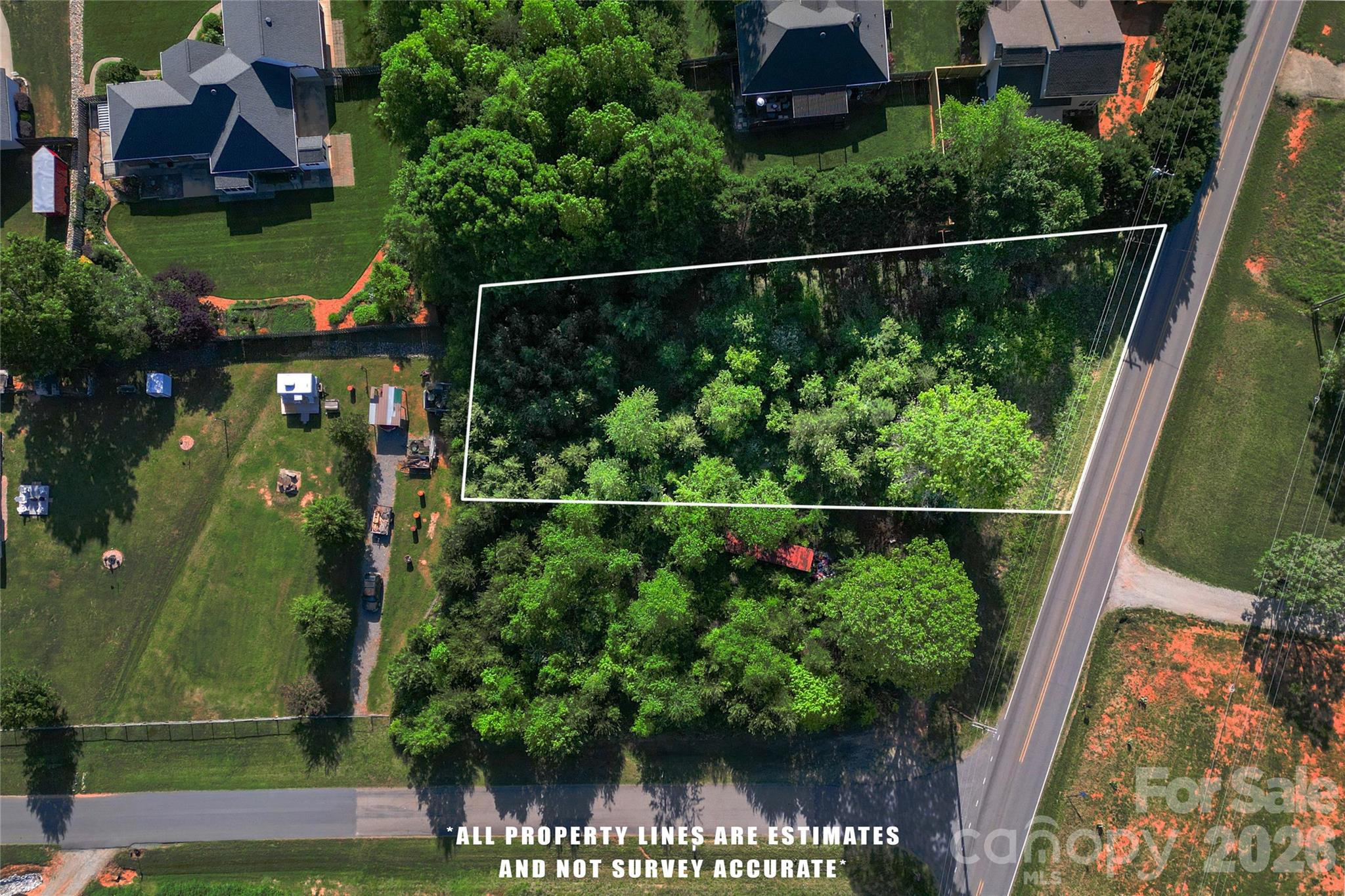 6914 Little Mountain Road Sherrills Ford, NC 28673 - Photo 2 of 2 a view of a garden from a window