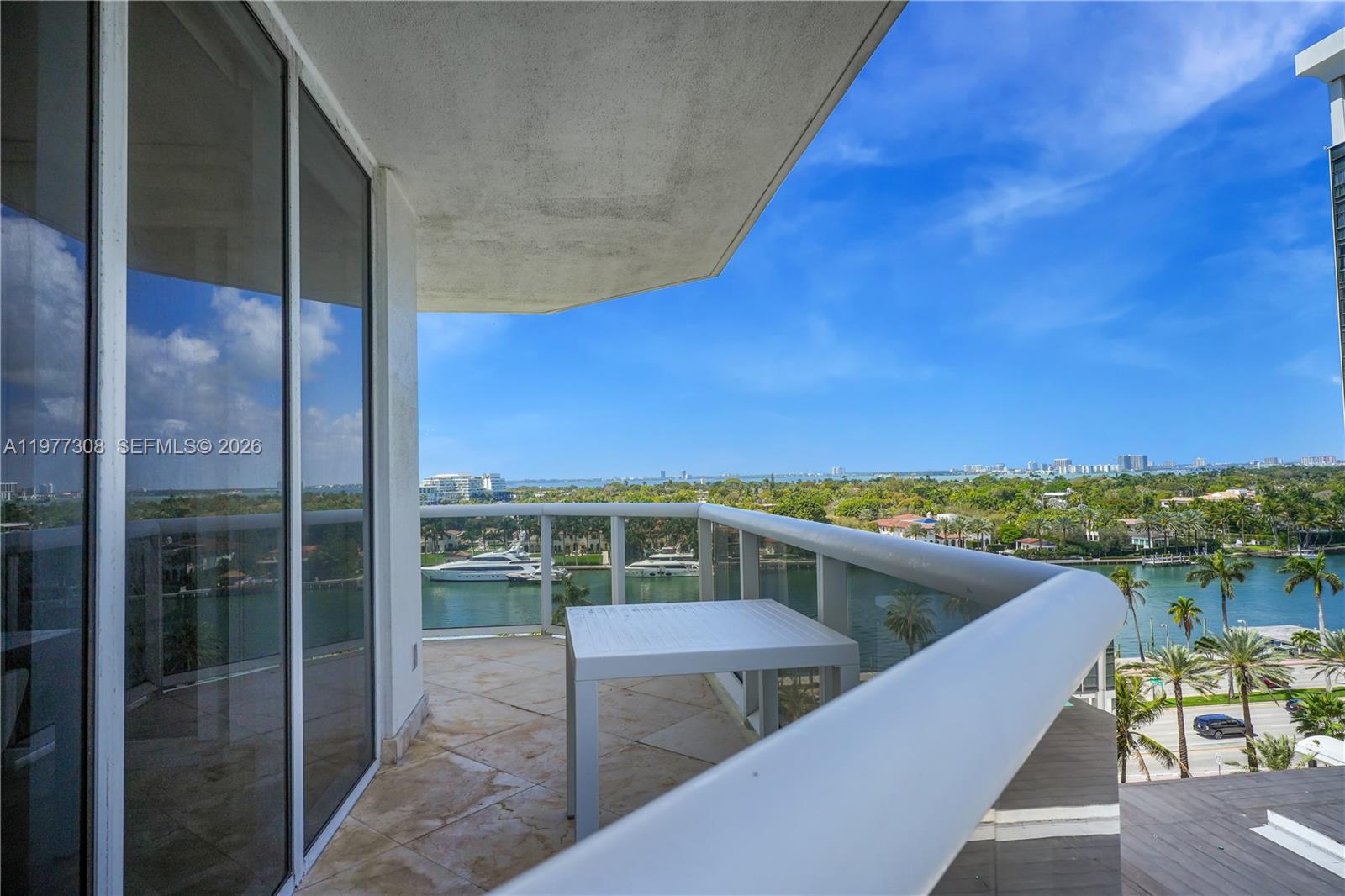 4779 Collins Avenue, Unit 1007 Miami Beach, FL 33140 - Photo 13 of 56 a view of balcony with seating space