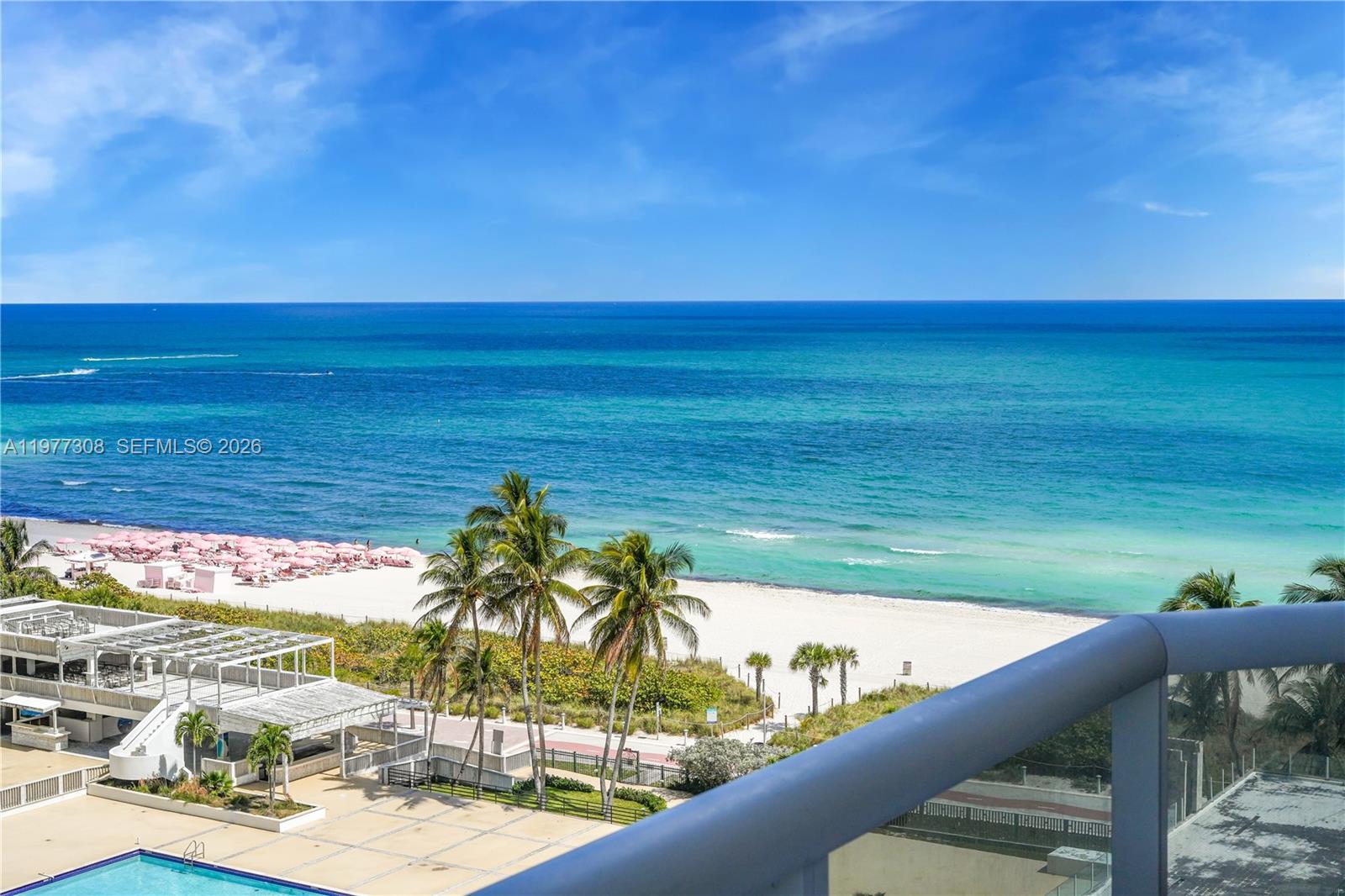 4779 Collins Avenue, Unit 1007 Miami Beach, FL 33140 - Photo 16 of 56 a view of a ocean from a balcony