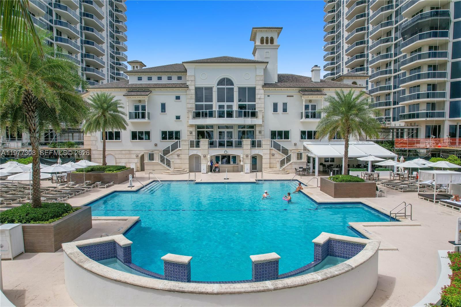 4779 Collins Avenue, Unit 1007 Miami Beach, FL 33140 - Photo 44 of 56 a view of a house with a swimming pool