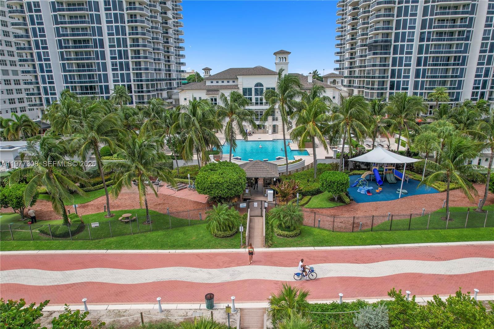 4779 Collins Avenue, Unit 1007 Miami Beach, FL 33140 - Photo 48 of 56 a view of a street with a building in the background