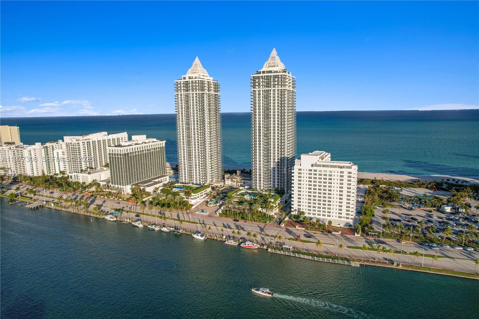 4779 Collins Avenue, Unit 1007 Miami Beach, FL 33140 - Photo 56 of 56 a front view of a building with lake view