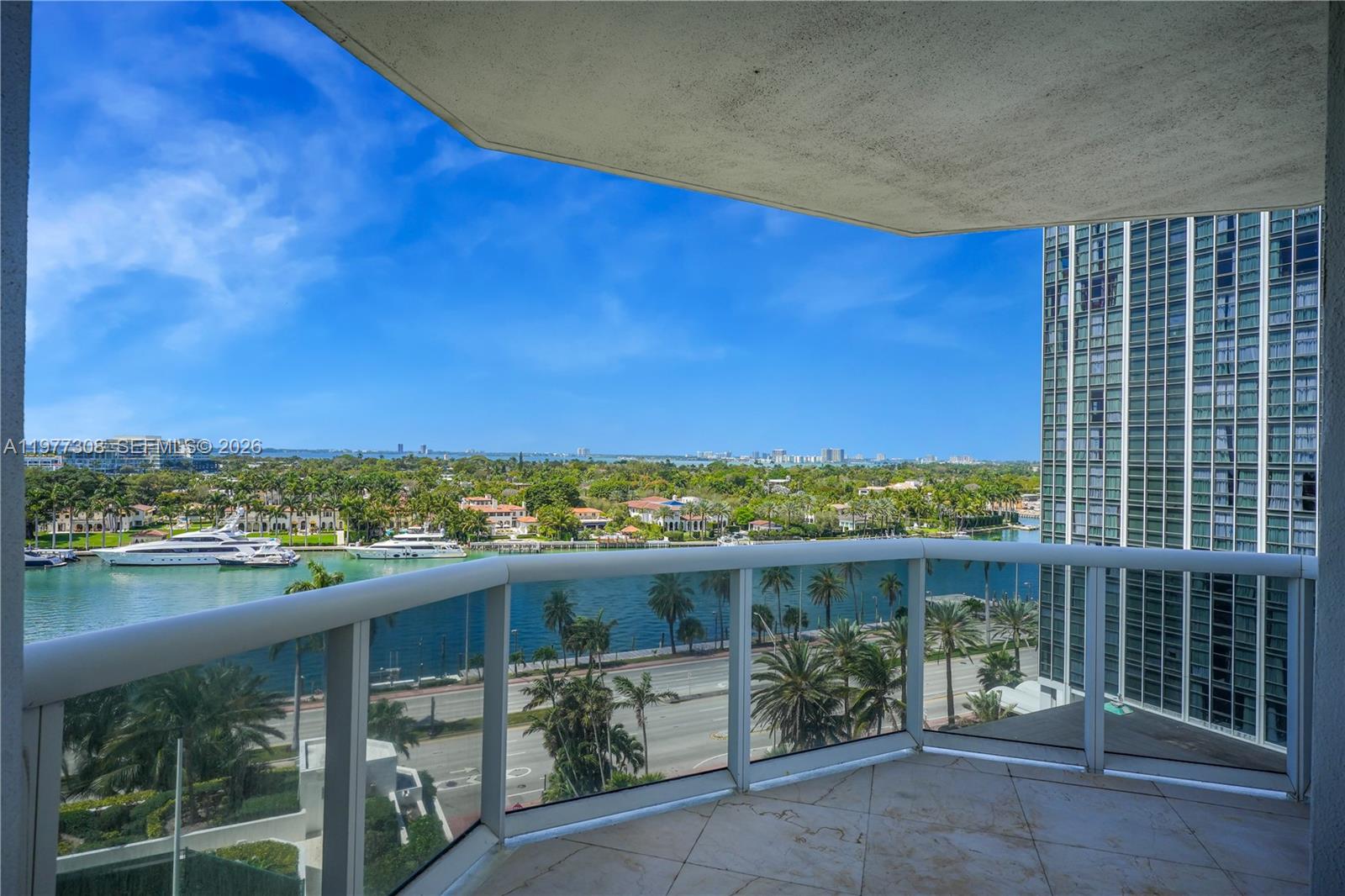 4779 Collins Avenue, Unit 1007 Miami Beach, FL 33140 - Photo 9 of 56 a view of a balcony with an outdoor space