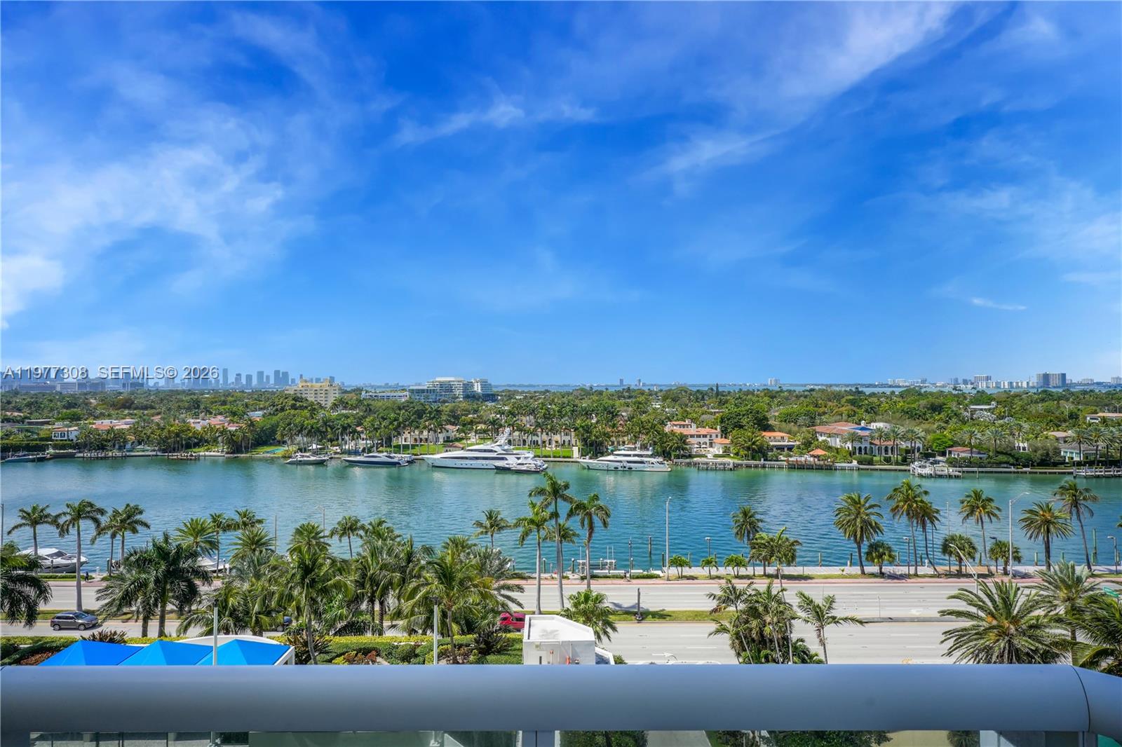 4779 Collins Avenue, Unit 1007 Miami Beach, FL 33140 - Photo 10 of 56 a view of a lake with a city