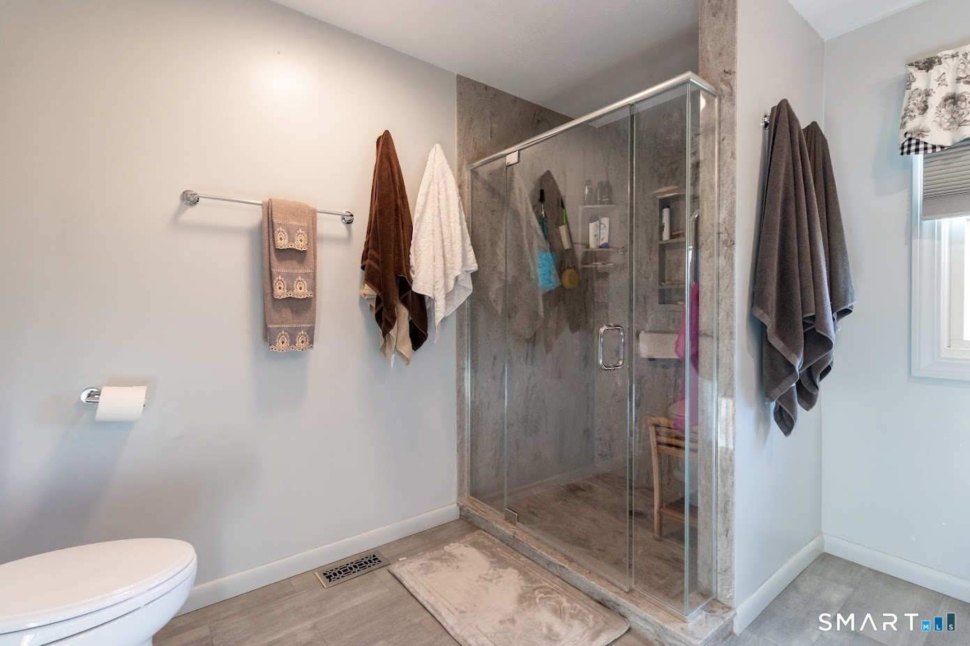 763 North Street Suffield, CT 06078 - Photo 29 of 40 a bathroom with a shower and toilet