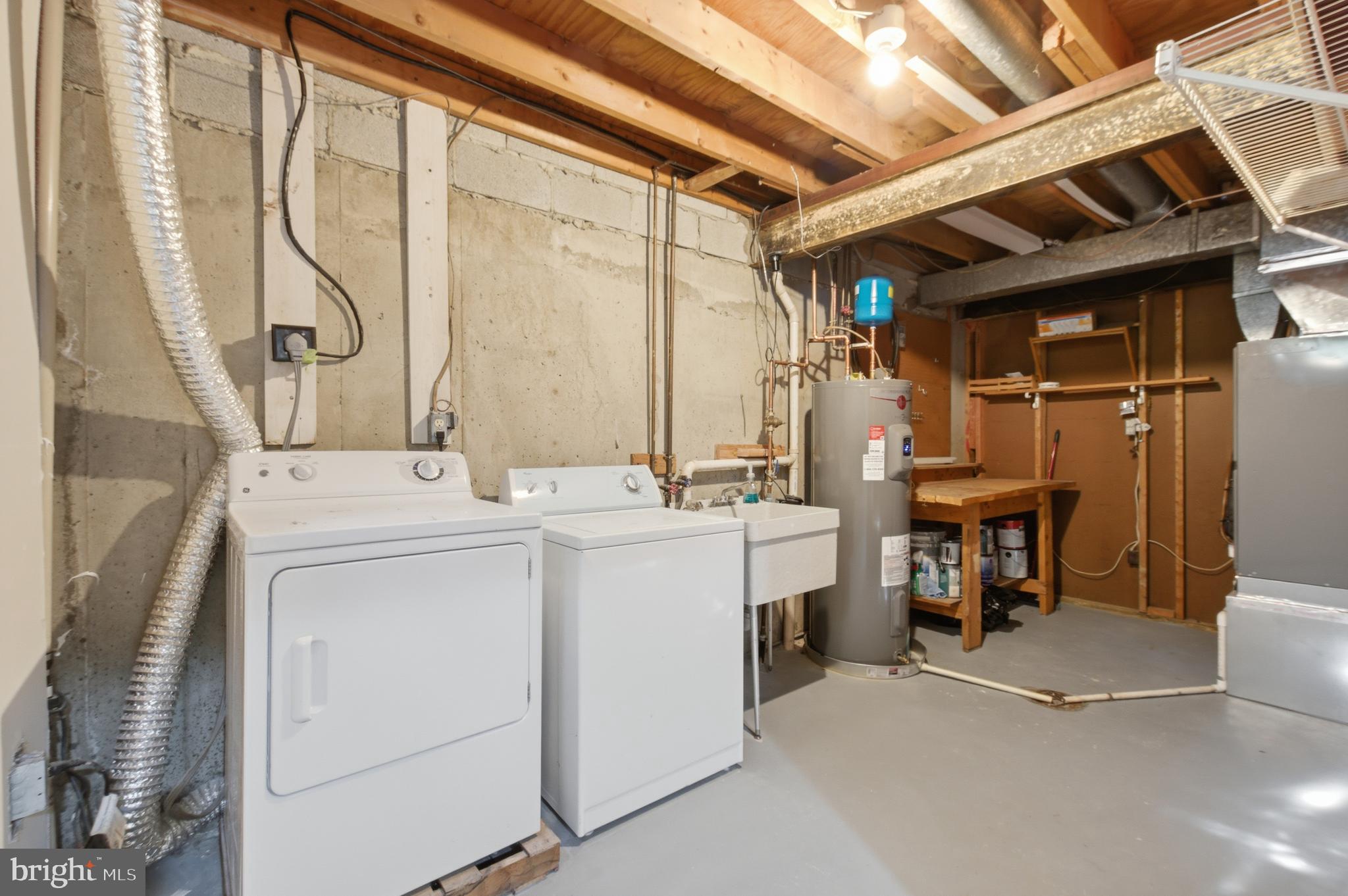 8575 Tyrolean Way Springfield, VA 22153 - Photo 26 of 29 a utility room with dryer and washer