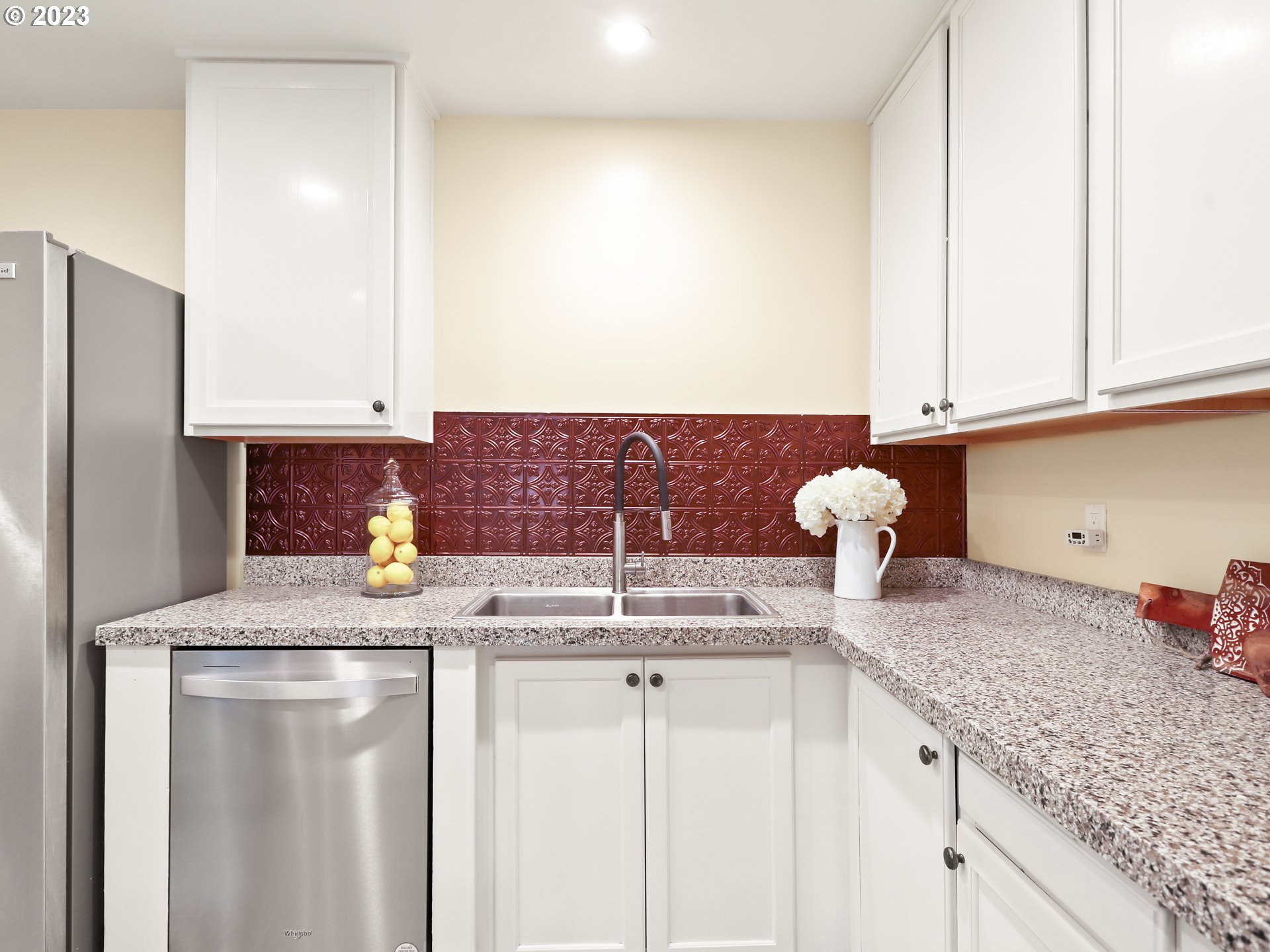 4524 Southeast 36th Place Portland, OR 97202 - Photo 11 of 41 a kitchen with granite countertop a sink and cabinets