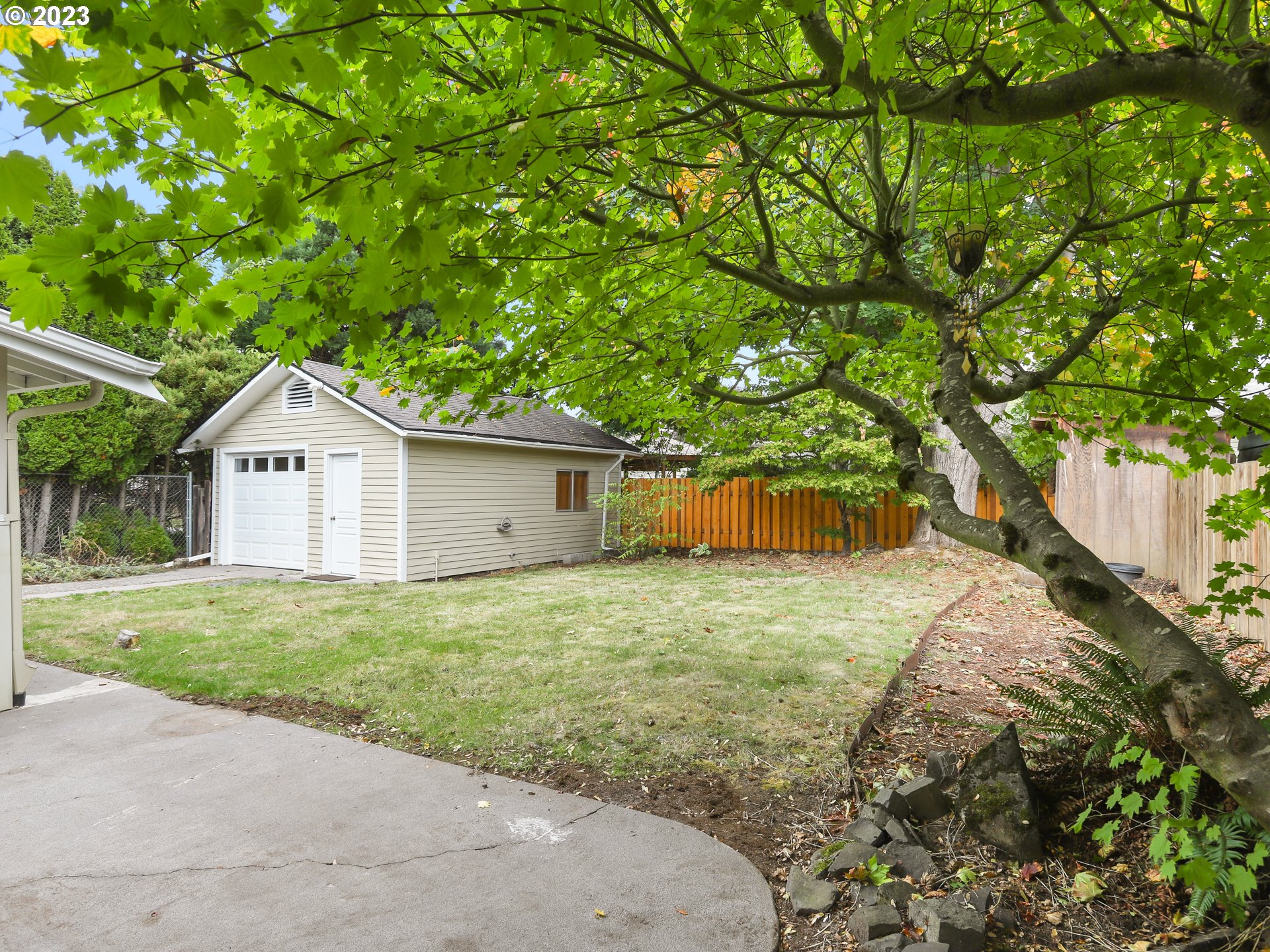 4524 Southeast 36th Place Portland, OR 97202 - Photo 35 of 41 a house with a tree in front of it
