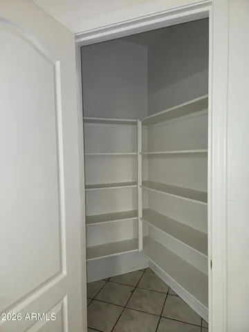 a empty closet with white paint