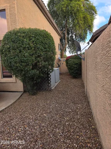 a backyard of a house with lots of green space