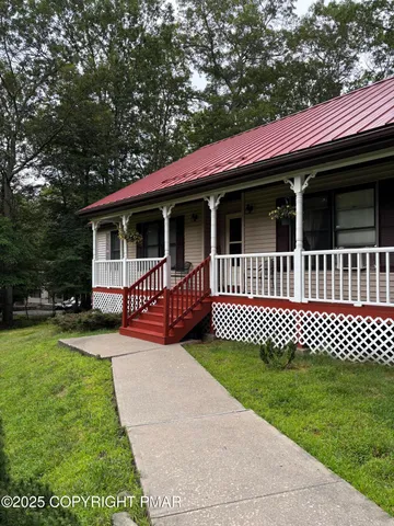 a view of a house with a deck