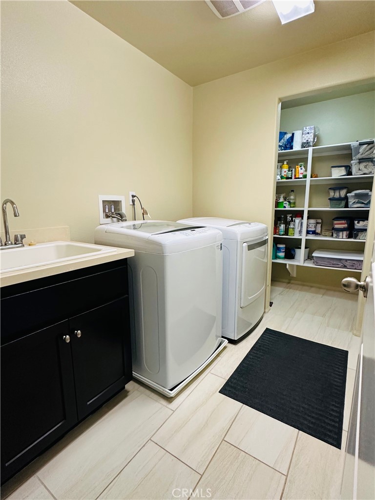 30097 Pine Needle Road Menifee, CA 92585 - Photo 37 of 61 2nd Floor Laundry With Closet