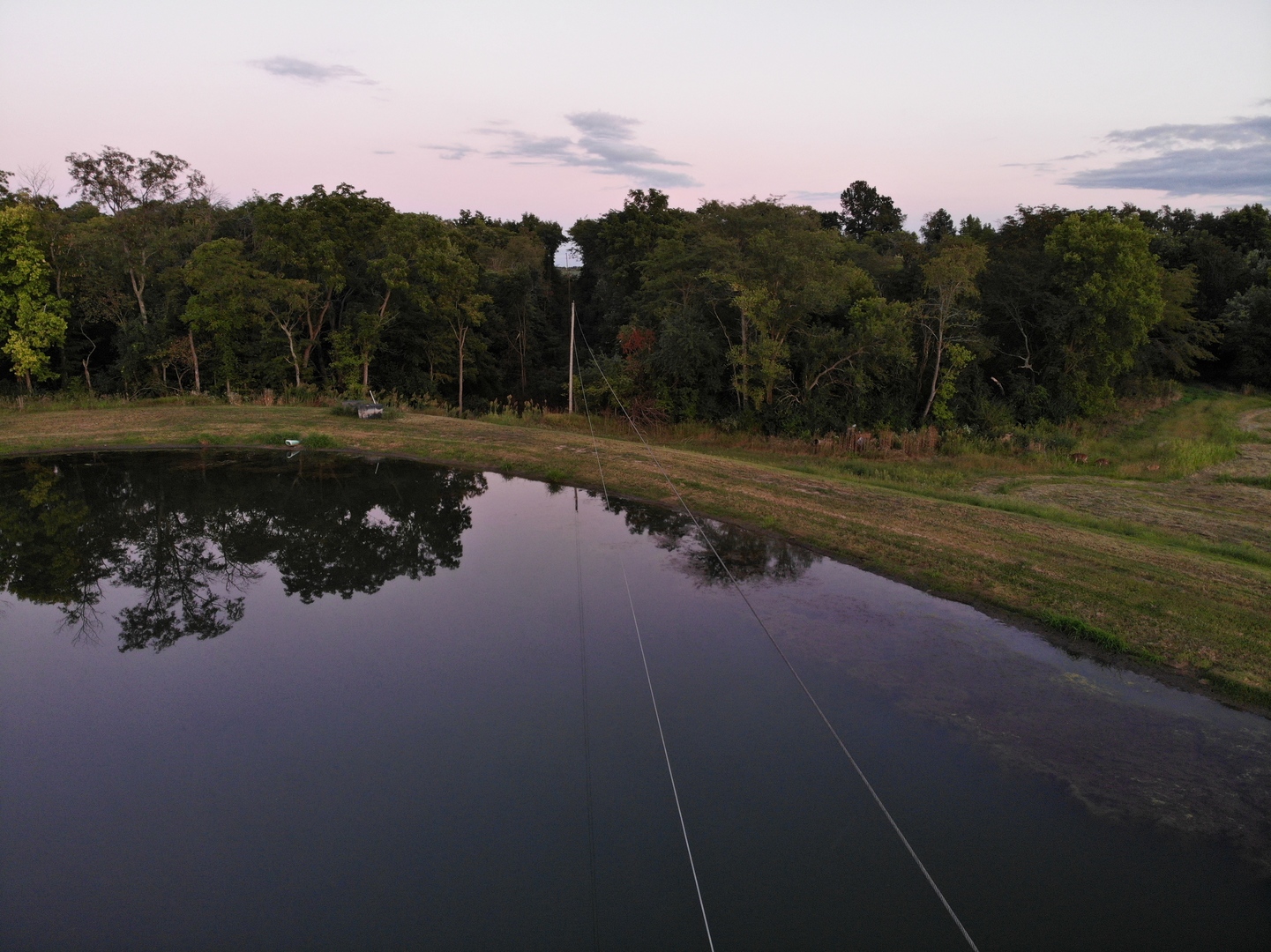 0 Betty Lane Clinton, IL 61727 - Photo 2 of 11 a view of a lake with a mountain in the background