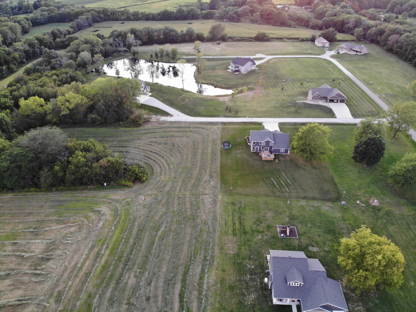 0 Betty Lane Clinton, IL 61727 - Photo 4 of 11 an aerial view of a house with a lake view
