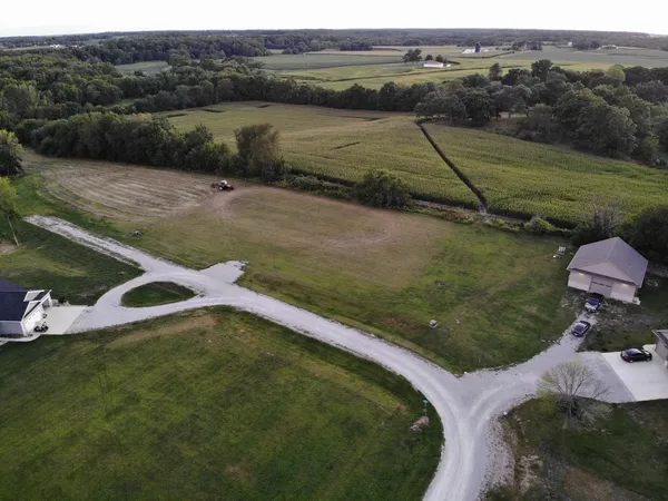 a view of a lake with a yard