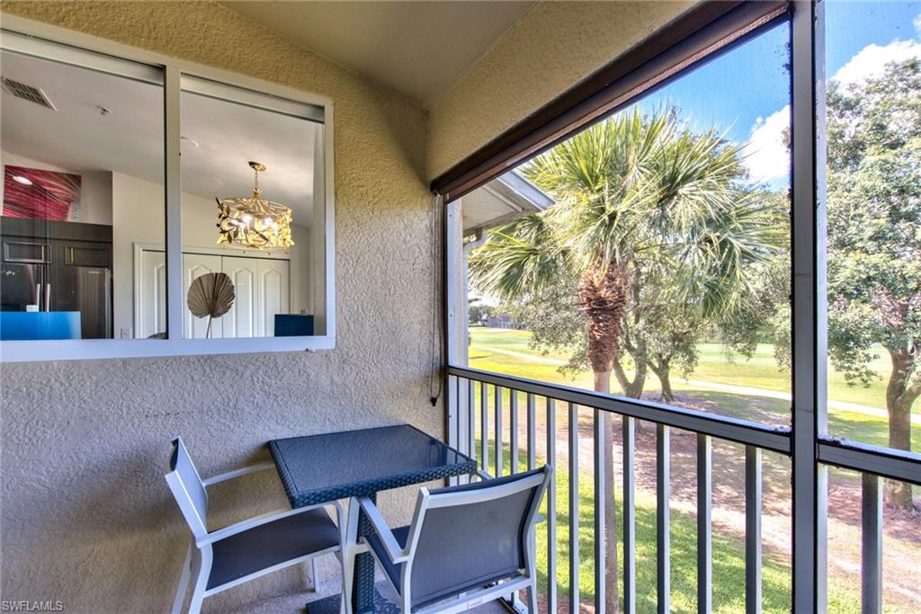 21340 Lancaster Run, Unit 1327 Estero, FL 33928 - Photo 17 of 27 a view of a outdoor seating area