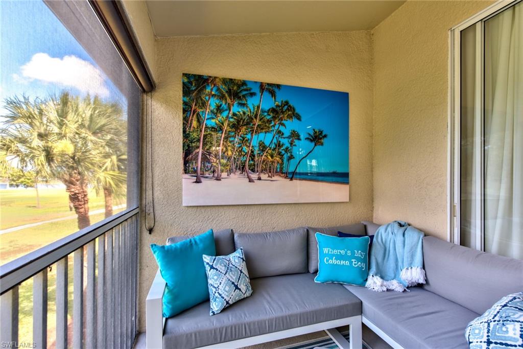 21340 Lancaster Run, Unit 1327 Estero, FL 33928 - Photo 18 of 27 a living room with furniture and a window