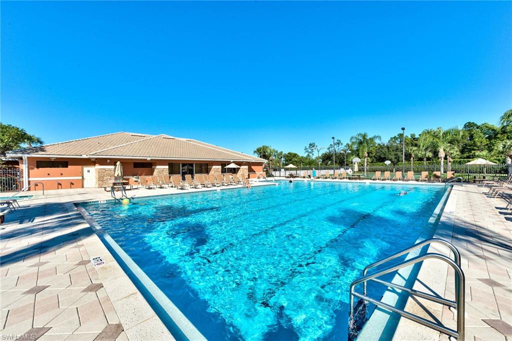 21340 Lancaster Run, Unit 1327 Estero, FL 33928 - Photo 22 of 27 a view of swimming pool with a yard