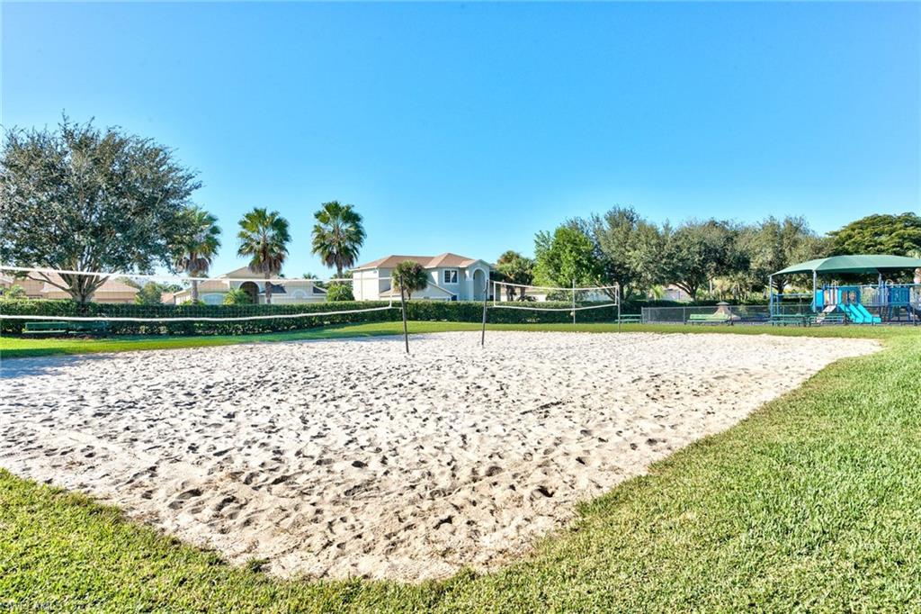 21340 Lancaster Run, Unit 1327 Estero, FL 33928 - Photo 26 of 27 a view of outdoor space with garden and trees