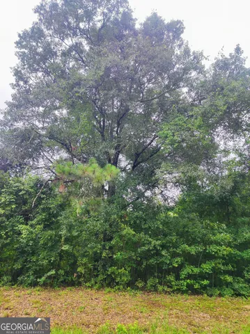 a picture of a bathroom with a shower