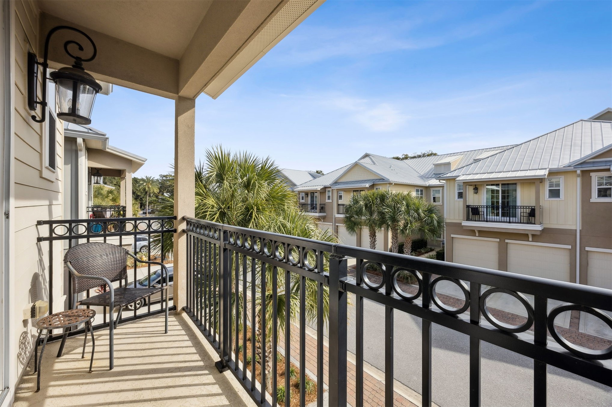 95049 Summer Crossing Road, Unit 1502 Fernandina Beach, FL 32034 - Photo 29 of 61 a view of a balcony with chairs