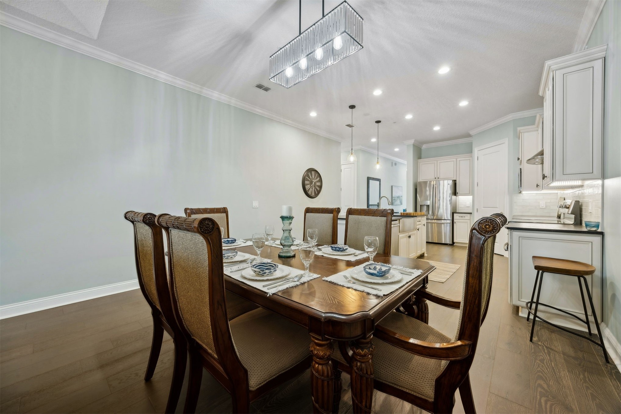 95049 Summer Crossing Road, Unit 1502 Fernandina Beach, FL 32034 - Photo 10 of 61 a view of a dining room with furniture and wooden floor