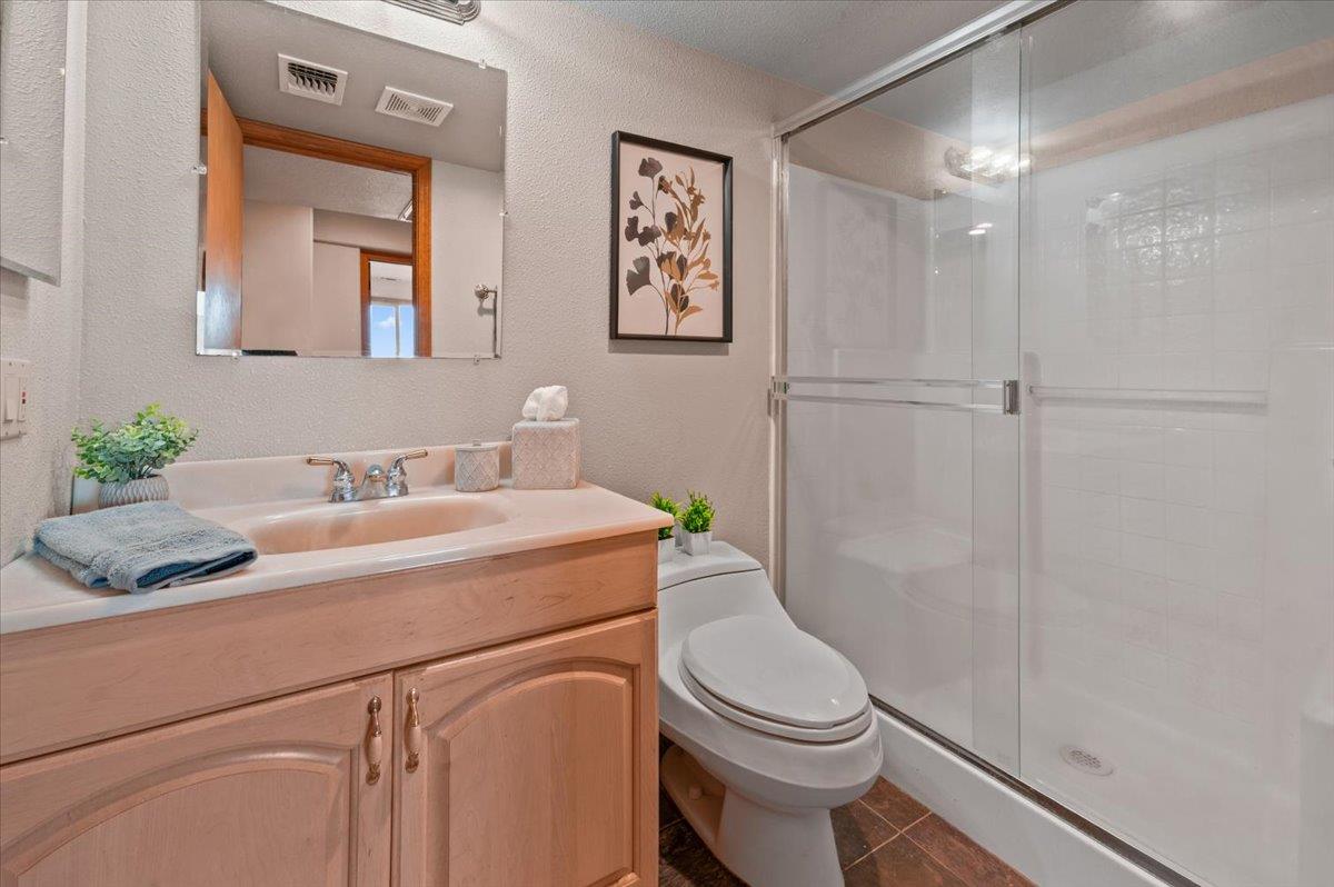 16000 Southridge Road Penn Valley, CA 95946 - Photo 47 of 75 a bathroom with a sink a toilet and shower