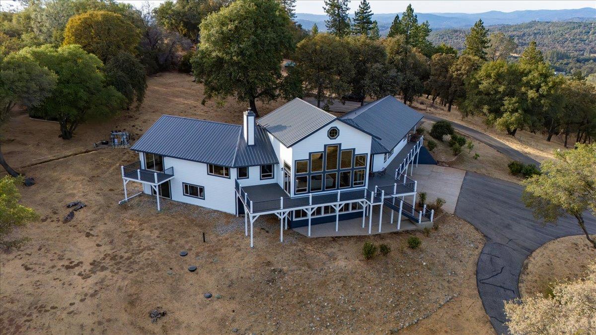 16000 Southridge Road Penn Valley, CA 95946 - Photo 64 of 75 an aerial view of a house with table and chairs