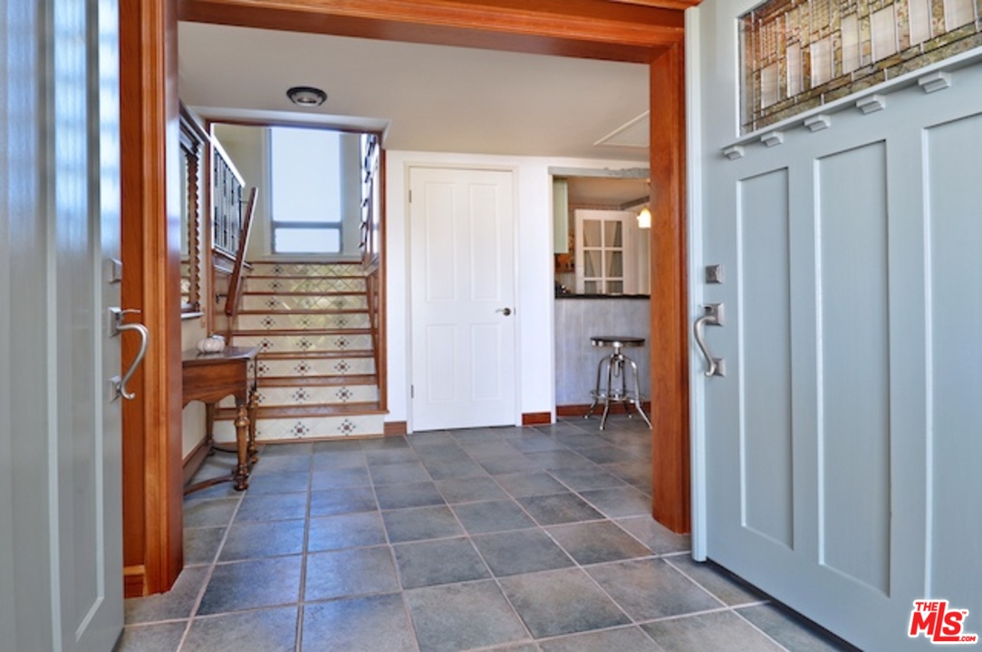 15098 Rayneta Drive Sherman Oaks, CA 91403 - Photo 15 of 51 a view of an entrance to house with yard