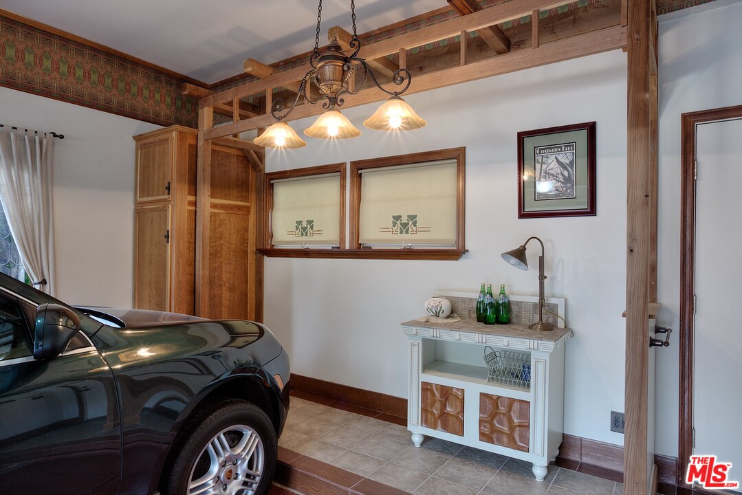 15098 Rayneta Drive Sherman Oaks, CA 91403 - Photo 27 of 51 a utility room with closet dryer and washer