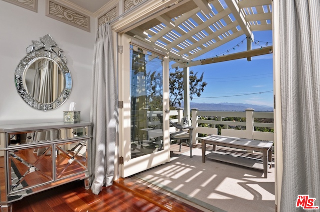 15098 Rayneta Drive Sherman Oaks, CA 91403 - Photo 31 of 51 a view of livingroom with furniture and a rug