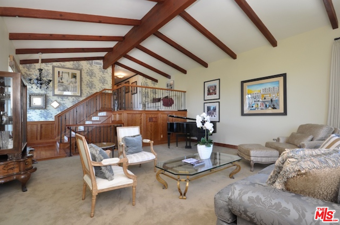 15098 Rayneta Drive Sherman Oaks, CA 91403 - Photo 35 of 51 a living room with furniture and wooden floor