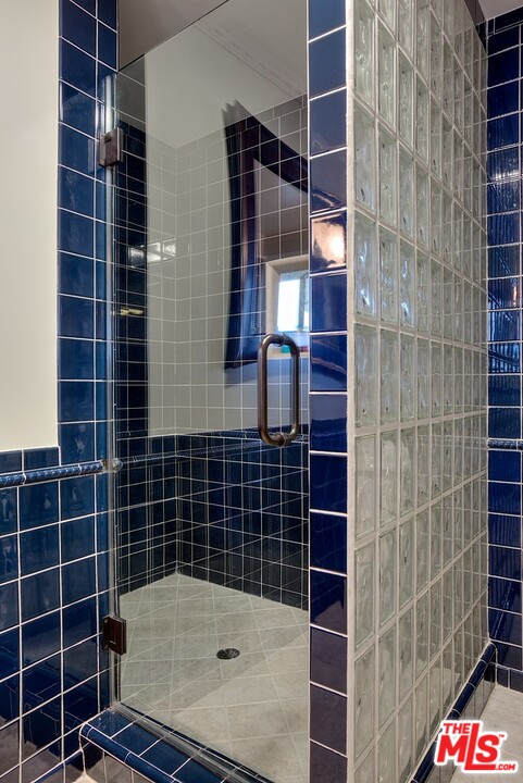 15098 Rayneta Drive Sherman Oaks, CA 91403 - Photo 41 of 51 a bathroom with a shower