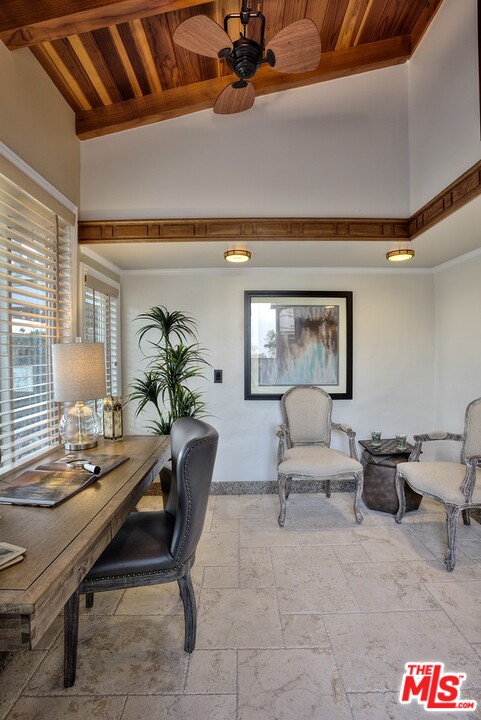 15098 Rayneta Drive Sherman Oaks, CA 91403 - Photo 46 of 51 a living room with furniture and a potted plant