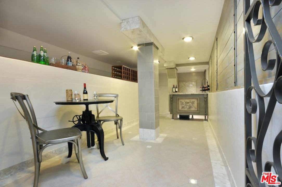 15098 Rayneta Drive Sherman Oaks, CA 91403 - Photo 48 of 51 a view of a hallway with furniture and a large window