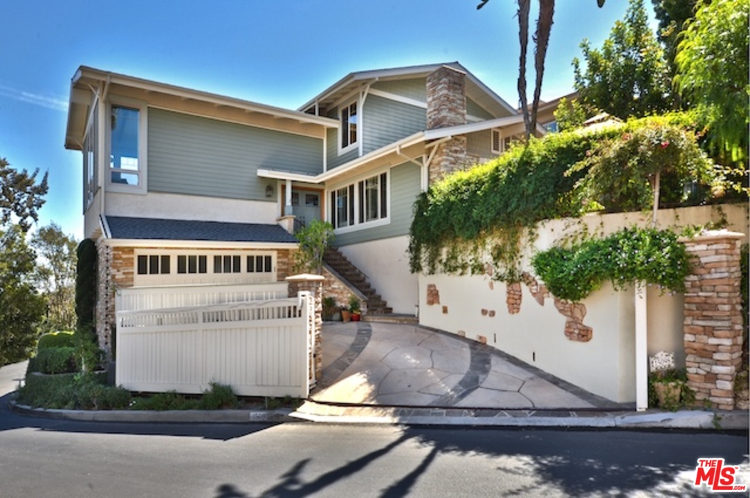15098 Rayneta Drive Sherman Oaks, CA 91403 - Photo 7 of 51 a view of a house with a yard