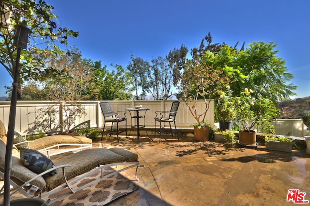 15098 Rayneta Drive Sherman Oaks, CA 91403 - Photo 10 of 51 a view of a terrace with chairs
